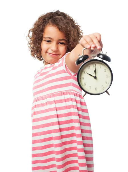 Black girl with an alarm clock — Stock Photo, Image