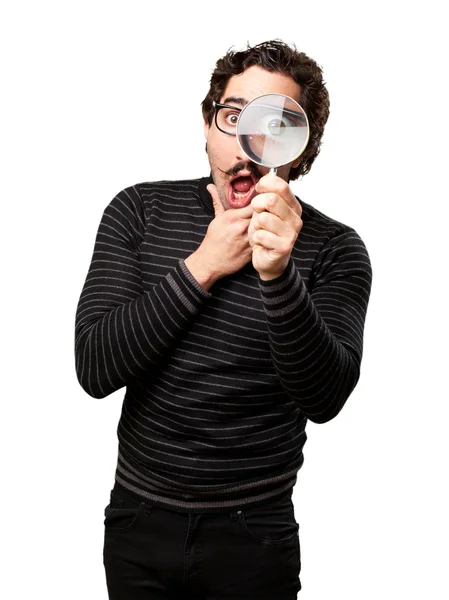 Pedantic man with a magnifier surprised — Stock Photo, Image