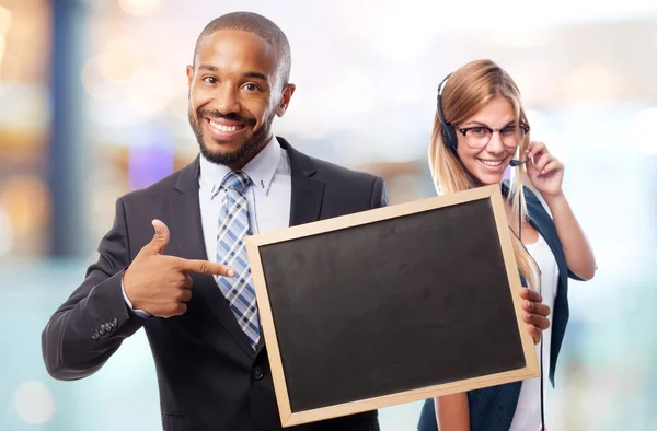 Jonge cool zwarte man met een schoolbord — Stockfoto