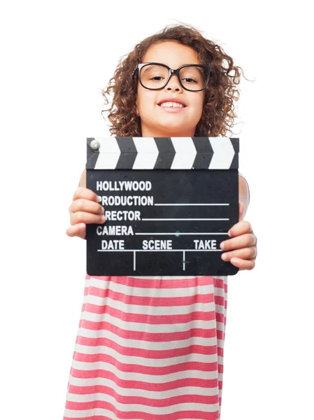 Black girl with a clapperboard — Stock Photo, Image