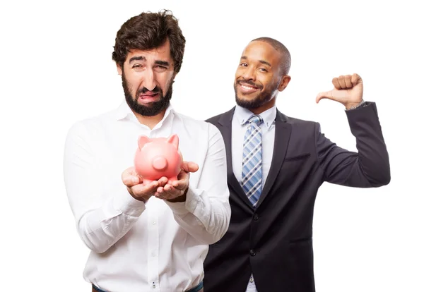 Homem com um banco porquinho — Fotografia de Stock