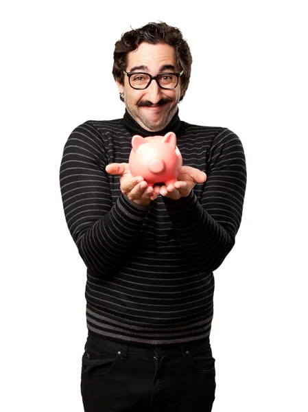 Pedantic man with a piggy bank — Stock Photo, Image