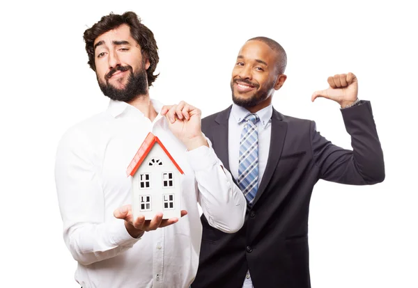 Man die een huis — Stockfoto