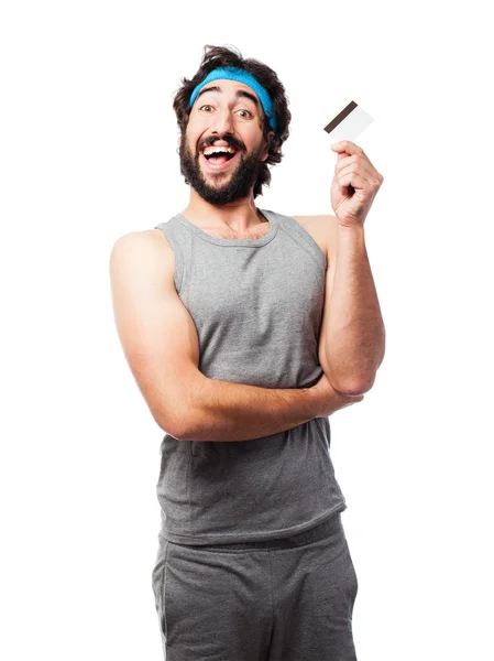 Sportsman with credit card — Stock Photo, Image