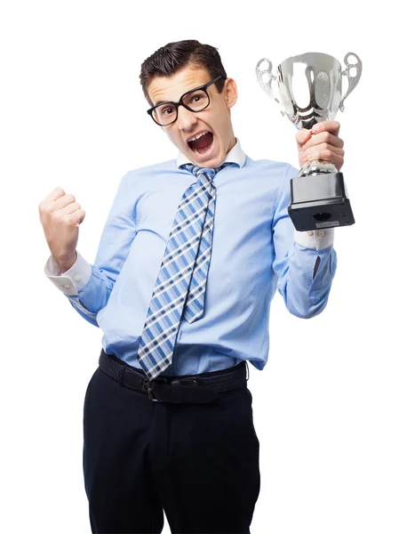 Businessman with a winner cup Stock Photo