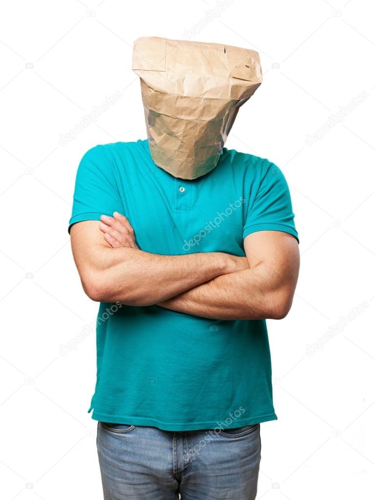 Crazy man with paper bag in his head. angry or sad concept