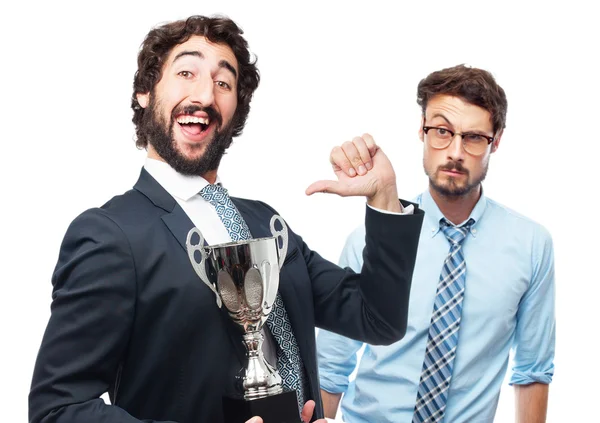 Hombre de negocios con una taza ganadora —  Fotos de Stock