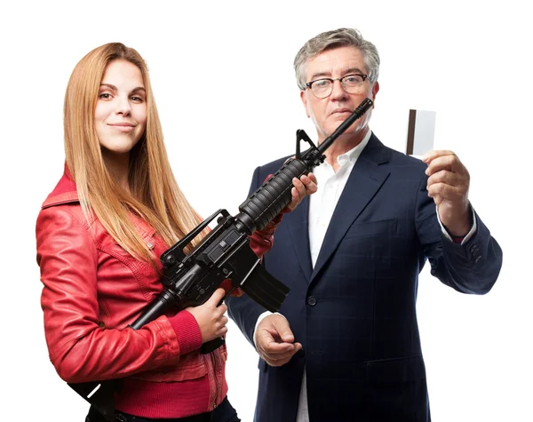 Blond woman with a gun — Stock Photo, Image
