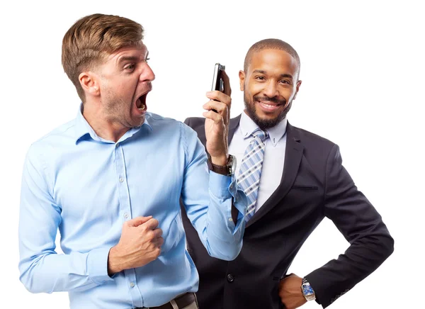 Blond man shouting on phone — Stock Photo, Image