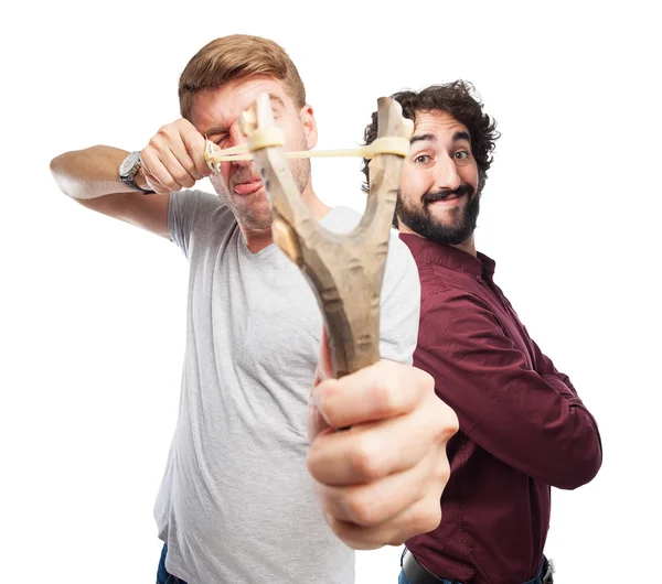 Blond man met een katapult — Stockfoto