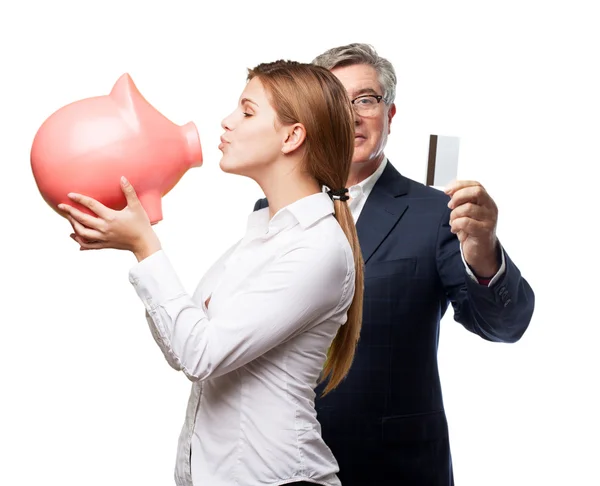 Blonde vrouw met een piggy bank — Stockfoto