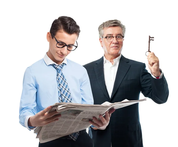 Businessman with newspaper — Stock Photo, Image