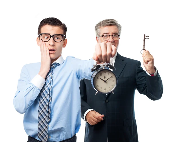 Hombre de negocios con un reloj — Foto de Stock