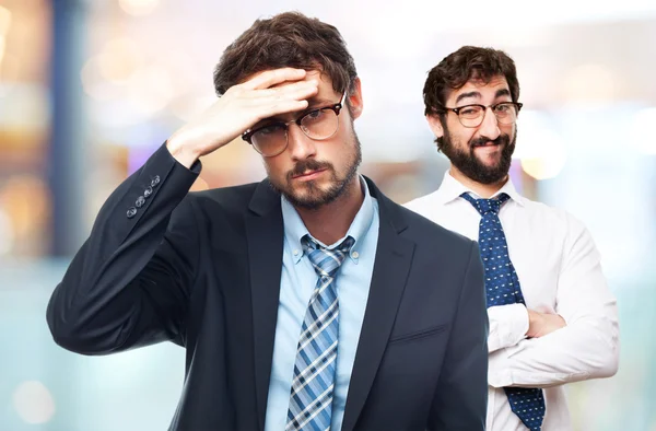 Young crazy businessman worried gesture — Stock Photo, Image