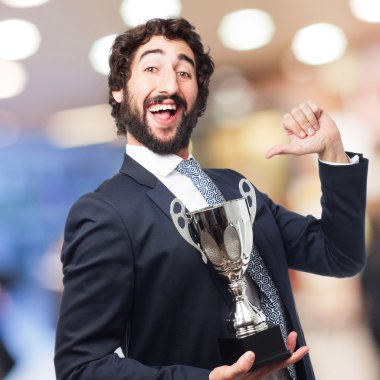 bir kazanan cup ile işadamı