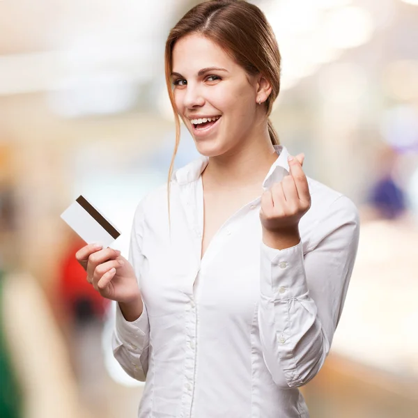 Blond woman with credit card — Stock Photo, Image