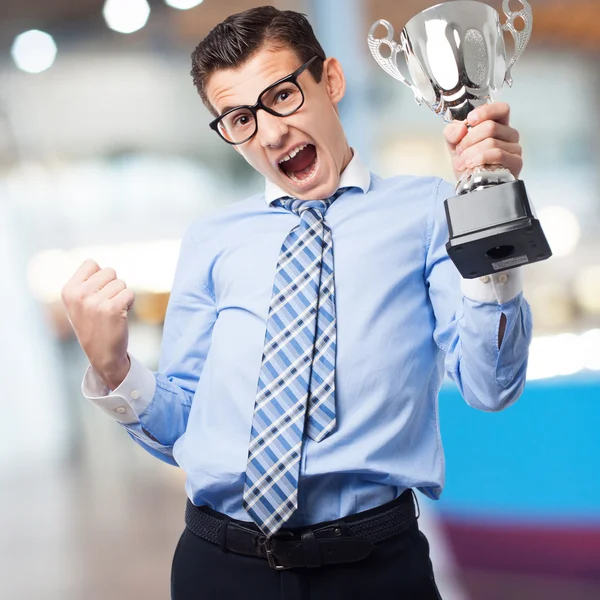 Businessman with a winner cup — Stock Photo, Image