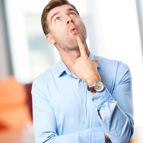 Blond man thinking — Stock Photo, Image