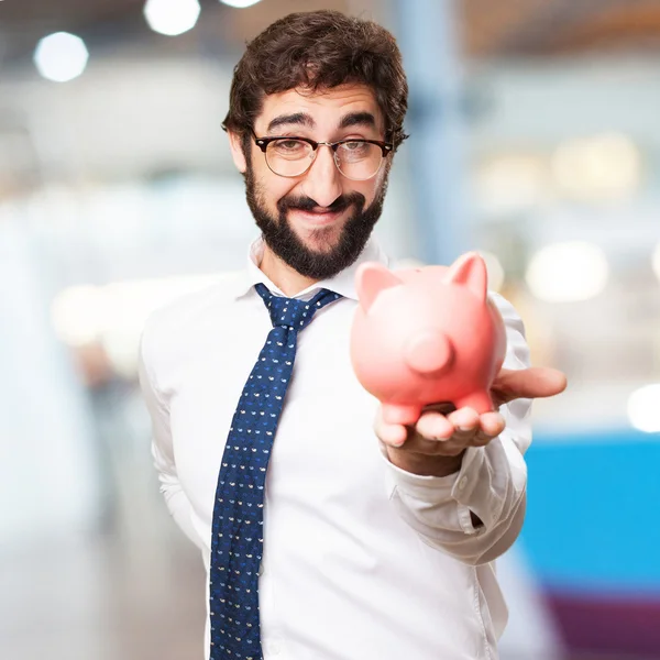 Hombre de negocios con alcancía —  Fotos de Stock