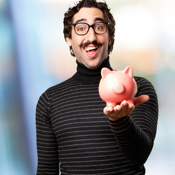 Pedant man met een piggy bank — Stockfoto