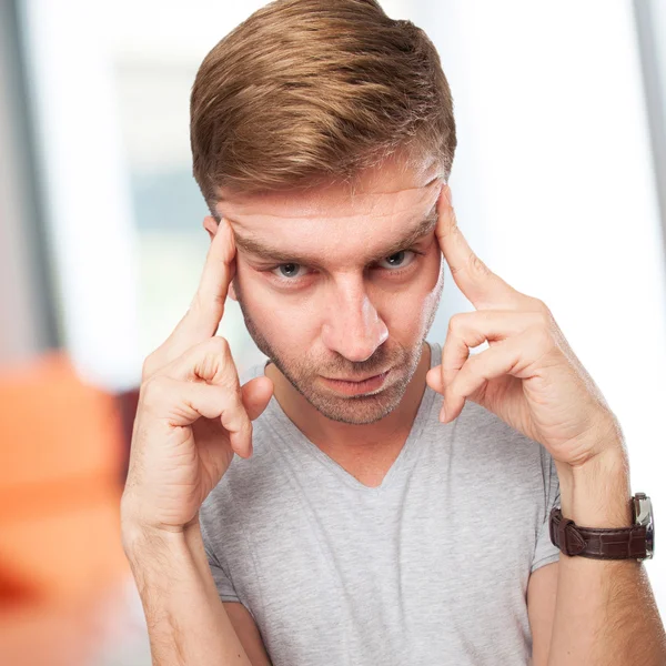 Blond man thinking — Stock Photo, Image