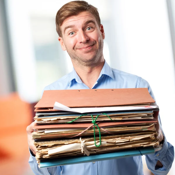 Homem loiro com arquivos — Fotografia de Stock