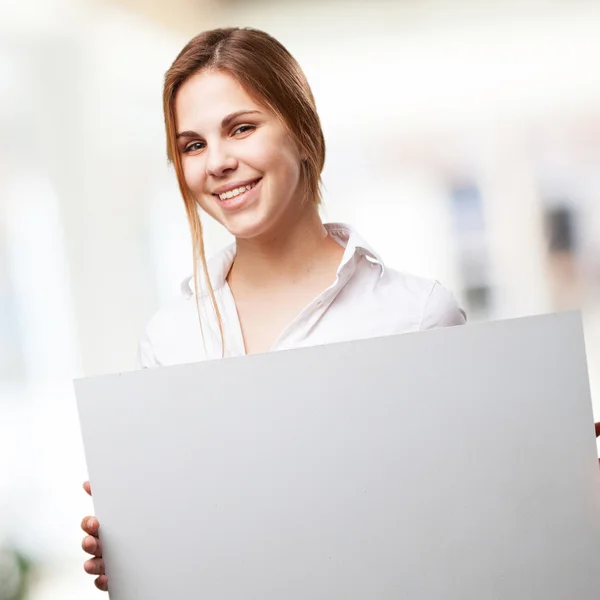 Blond kvinna med ett plakat — Stockfoto