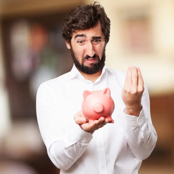 Man with a piggy bank — Stock Photo, Image