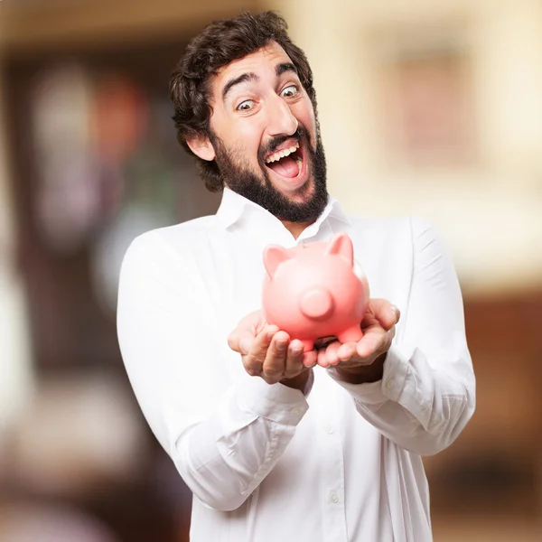 Man with a piggy bank — Stock Photo, Image