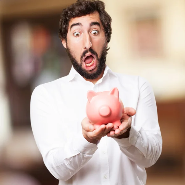 Man met een piggy bank — Stockfoto