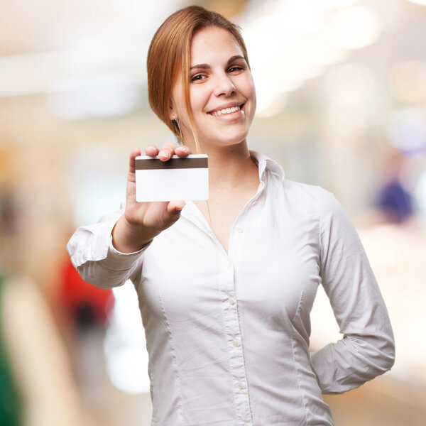 blond woman with credit card