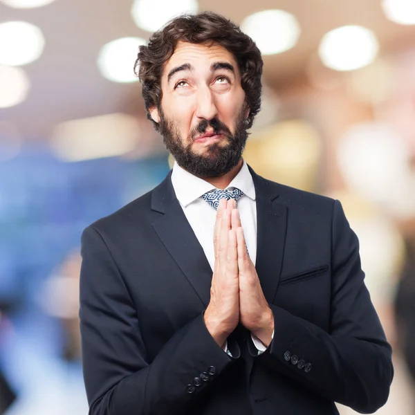 Businessman praying — Stock Photo, Image