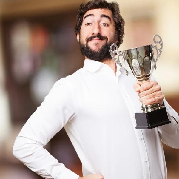 Man met een kampioen kopje — Stockfoto