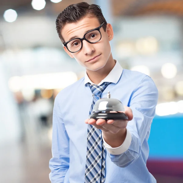 Businessman with a bell — Stock Photo, Image