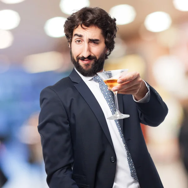 Homem de negócios com um copo de bebida — Fotografia de Stock