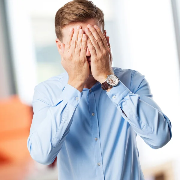 Blond man covering face sign — Stock Photo, Image
