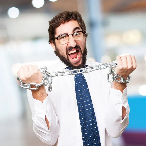 Businessman with a chain — Stock Photo, Image
