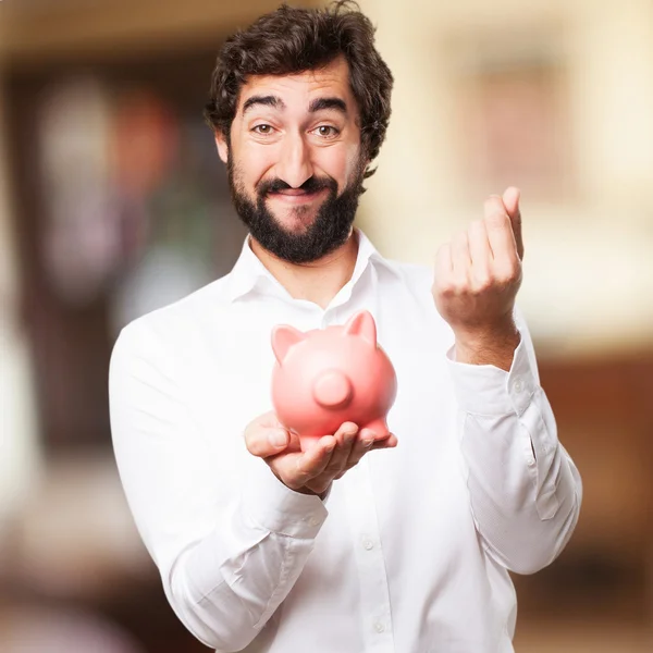 Mann mit Sparschwein — Stockfoto