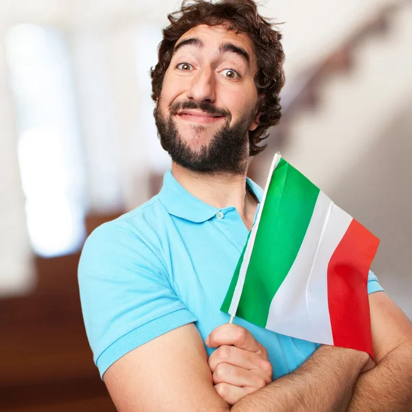 Crazy man with flag — Stock Photo, Image