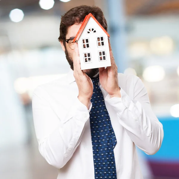 Businessman with a house — Stock Photo, Image