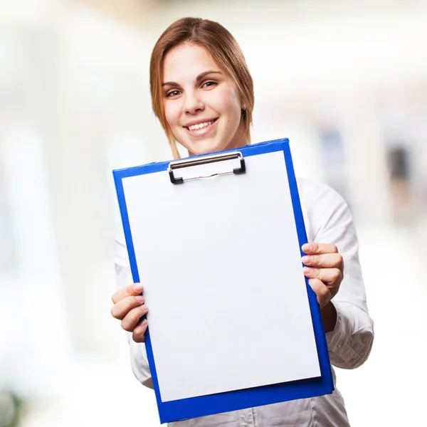 Blond woman with paper and pen — Stock Photo, Image