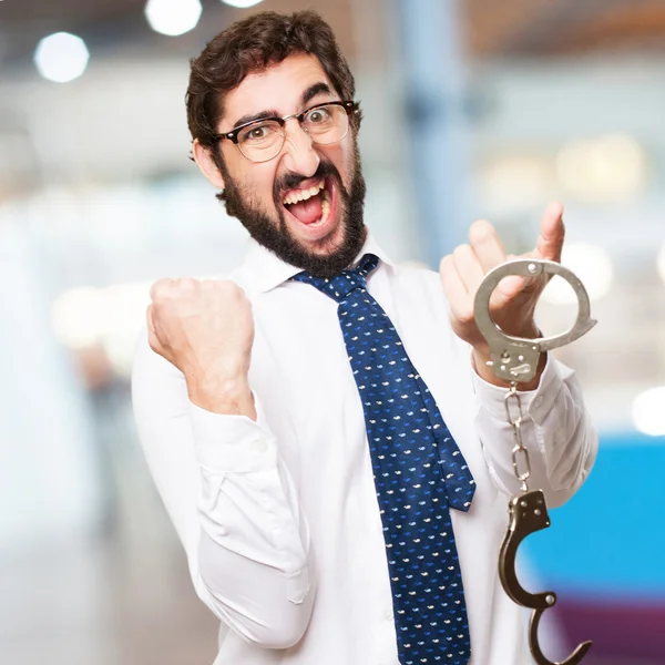 Businessman with handcuffs — Stock Photo, Image