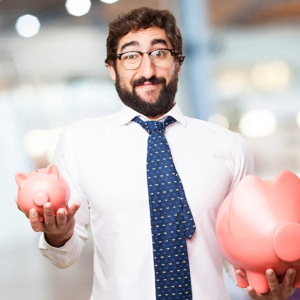 Hombre de negocios con alcancía — Foto de Stock