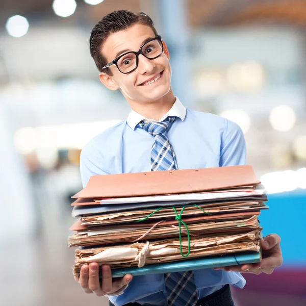 Businessman with archives — Stock Photo, Image