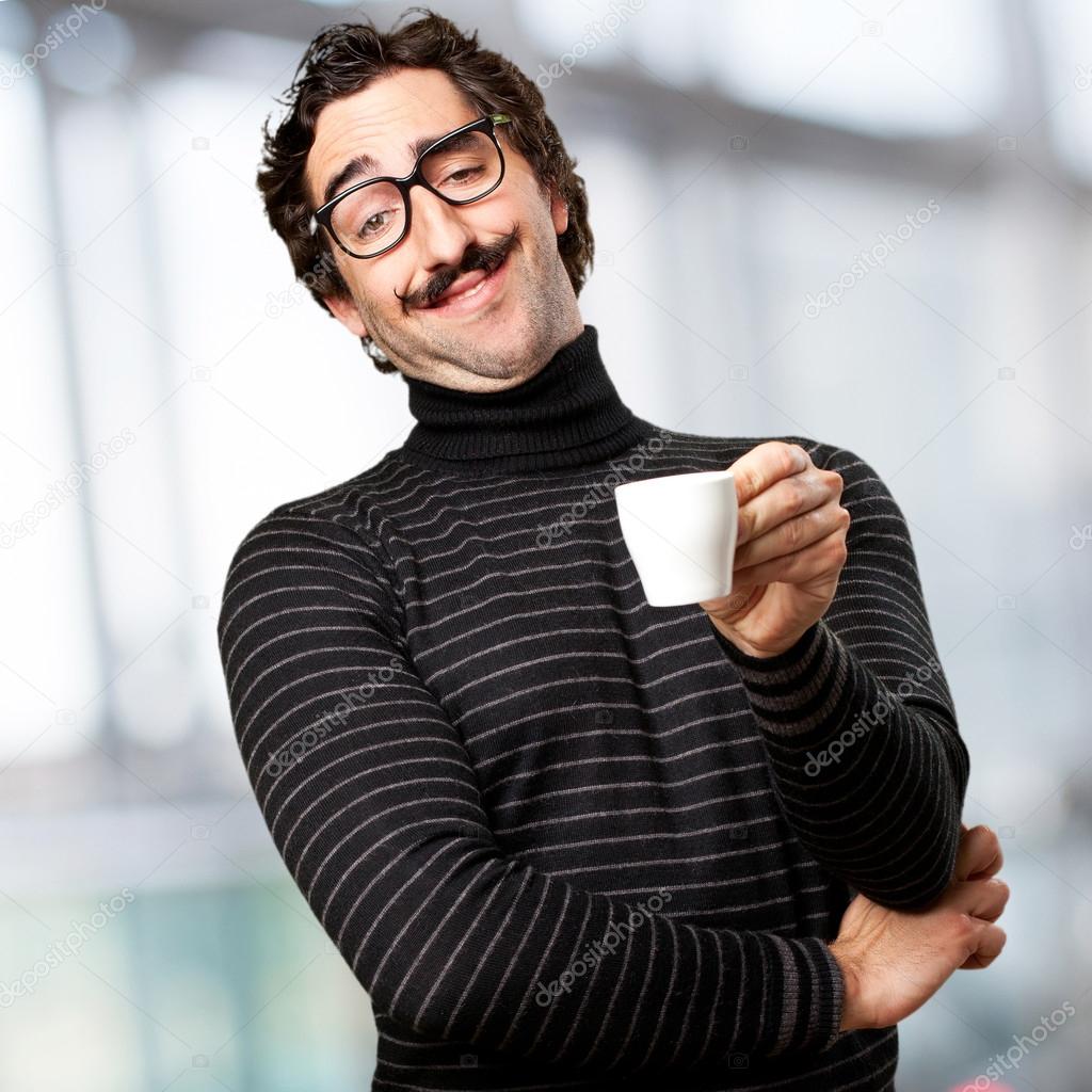 pedantic man having a coffee
