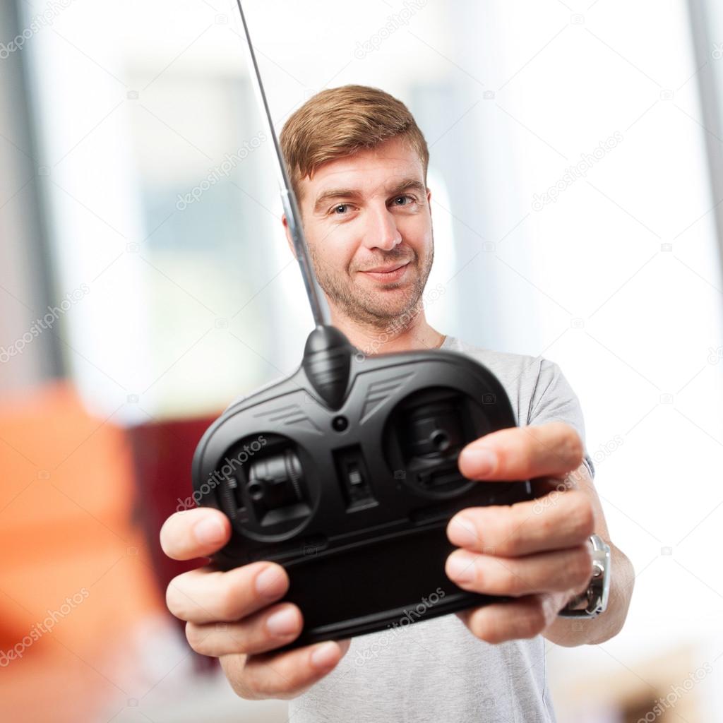 blond man with remote control