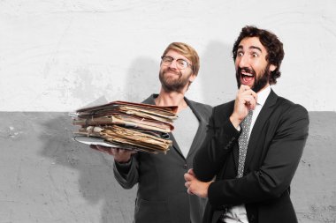 surprised businessman and businessman with documents