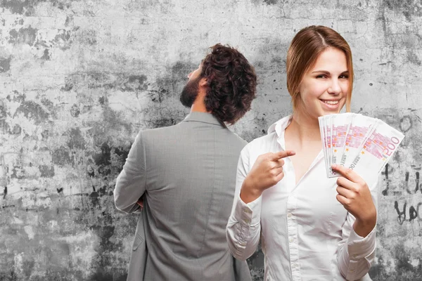 Blond woman with money — Stock Photo, Image