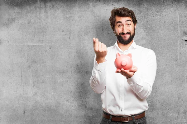 Man with a piggy bank — Stock Photo, Image