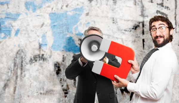 Geschäftsmann mit Magnet — Stockfoto